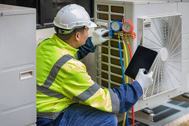 Professional Heat Pump Repair technician working in Medford, WI